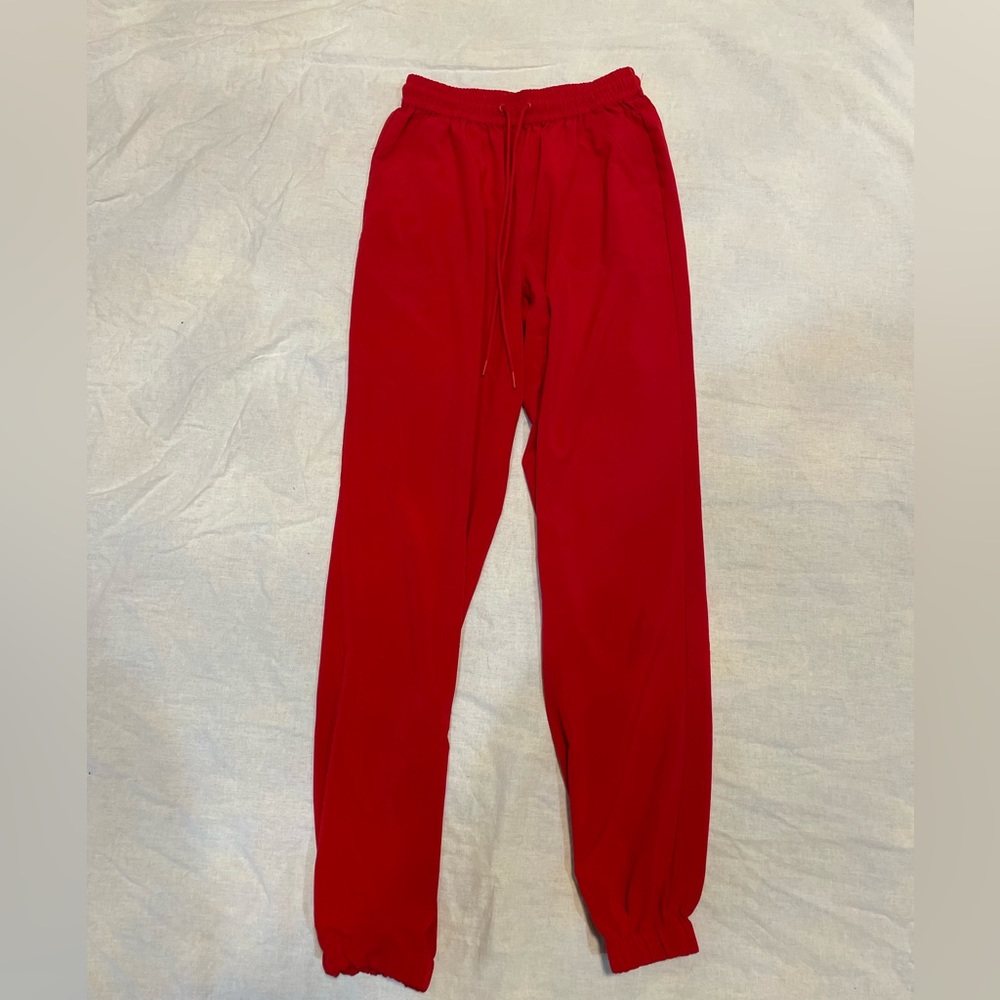 Aritiza TNA red joggers